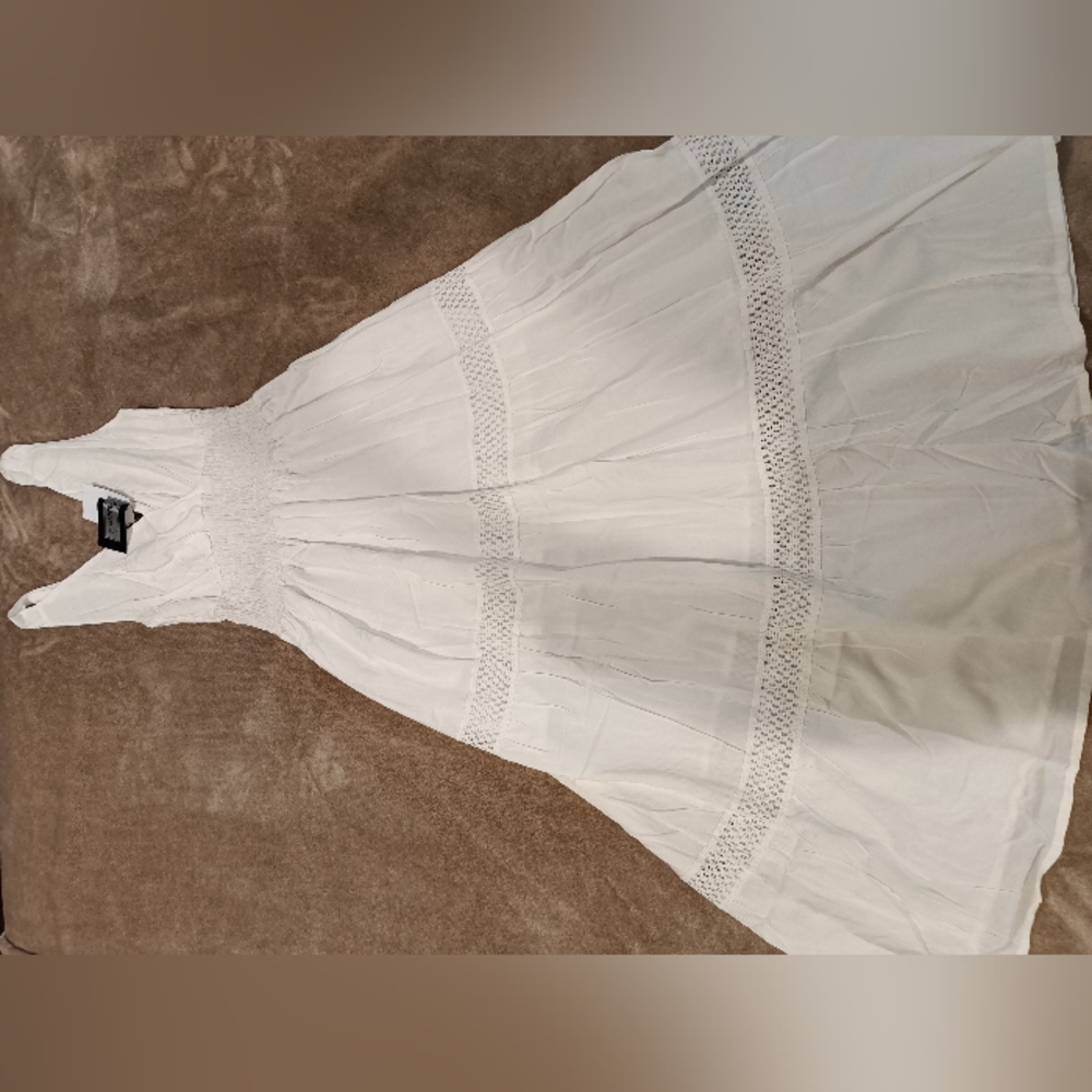 Long white dress with thread lace stripes
